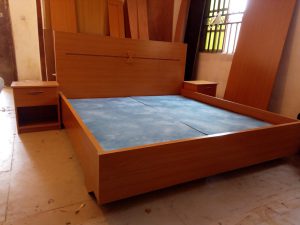 Brown wooden bed